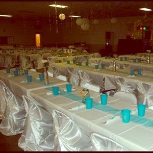 100 satin ivory universal chair covers.