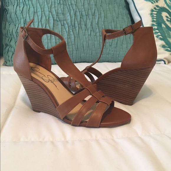 7 1/2 Beautiful tan wedges. 3 1/2 inch heel.