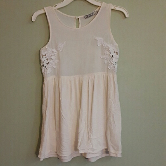Cream dress with crocheted sides