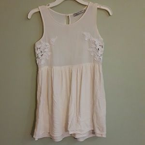Cream dress with crocheted sides