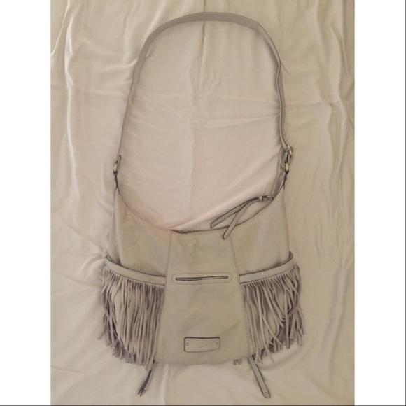 Lucky brand light tan leather purse with fringe