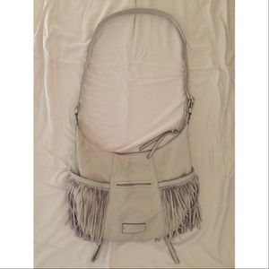 Lucky brand light tan leather purse with fringe