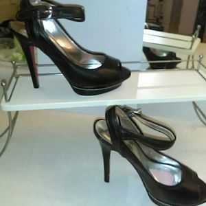 Paris Hilton heels, pink bottoms.