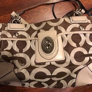 Brown and white coach bag
