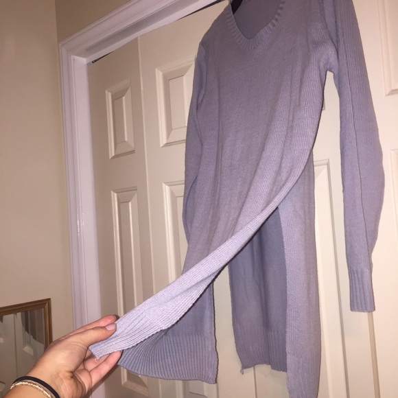 Grey sweater with a high side split
