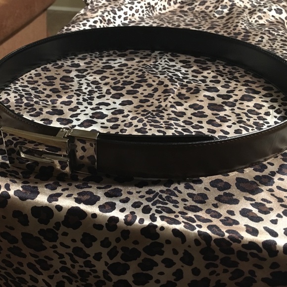 Gucci belt. It's reversible (black or brown)