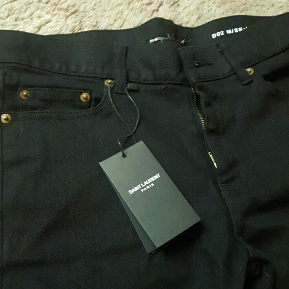 Black jeans with ripped knees