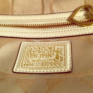 Gold coach purse