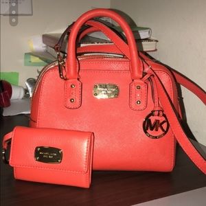 Red Michael kors handbag & wallet.