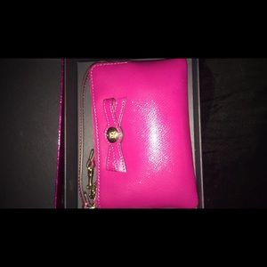 Coach pink zip wristlet/wallet