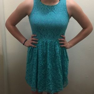 Lacey dress in a lighter teal color