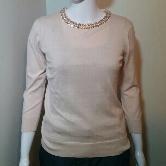 pink sweater with embellished collar