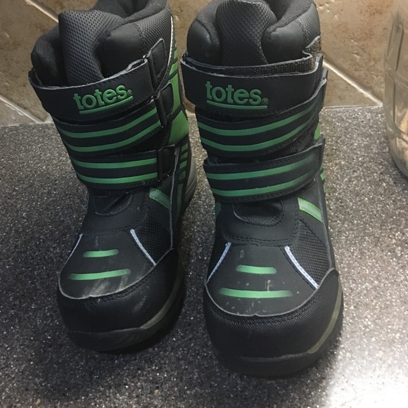 Green and black snow boots