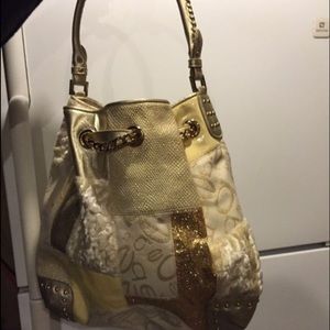 Bebe Gold Patch Work Handbag $399
