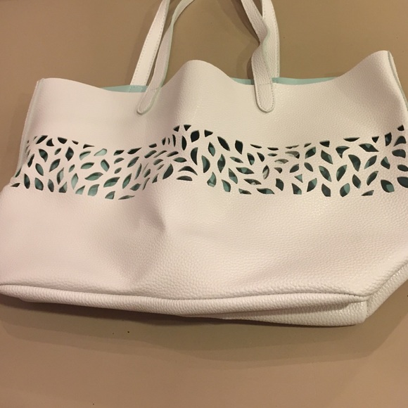 White cut out purse