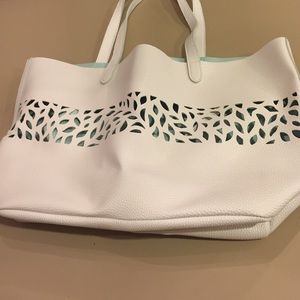 White cut out purse
