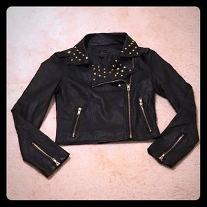 Faux leather jacket with studs and zippers