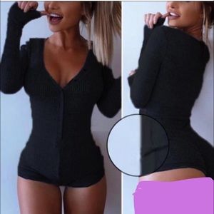 Brand new black pj onesie! Fits like size xs/s