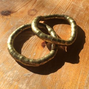 Flexible brass bracelets