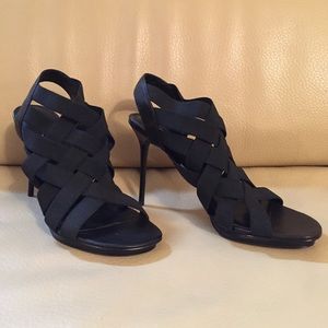 Black elastic sandals size 8 by Donald J Plinter