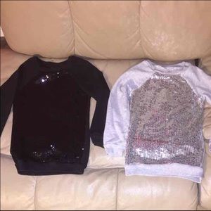2 girls' sequin front sweaters