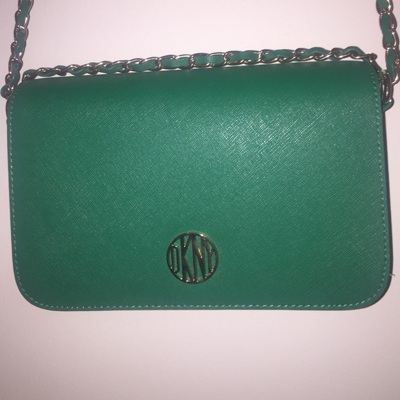Green DKNY purse with gold hardware