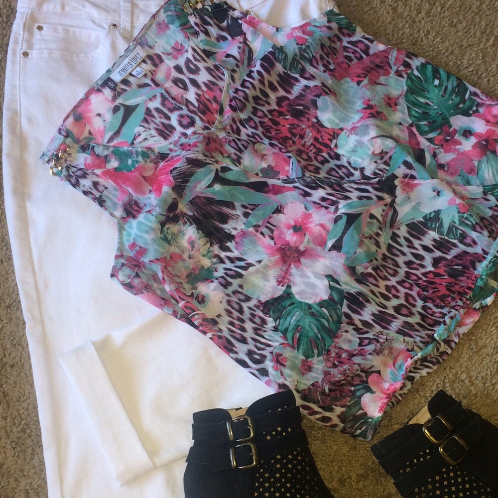 Beautiful sheer floral J-Lo faux wrap blouse.