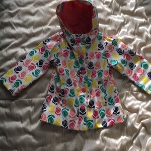 NEW - Raincoat with lining and a hood.