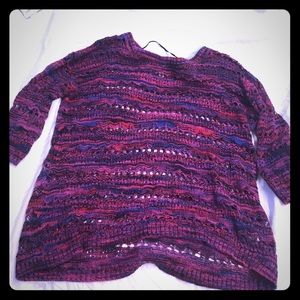 Colorful sweater with holes