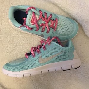 Brand New Girls Nike Free 5.0 running shoe