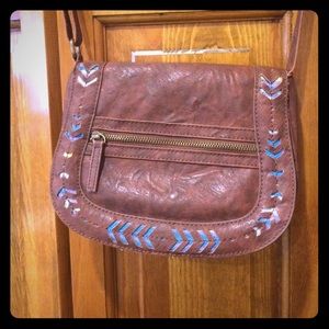 Brown cross body bag.