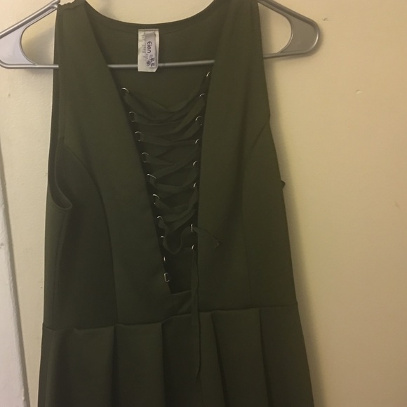 A olive green knee high dress.