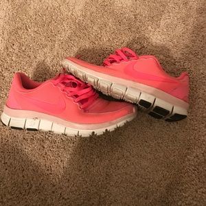 Pink Nike tennis shoes