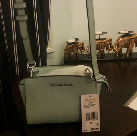Michael kors mini messenger leather