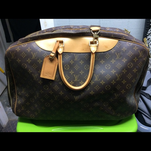 Louis Vuitton Ava Dione Triple Zipper traveler