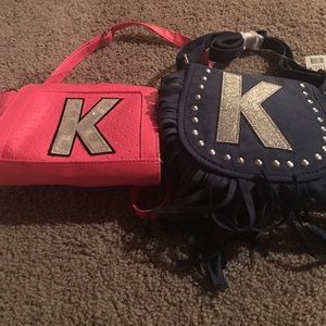 2 Justice K purses.  1 new with tags