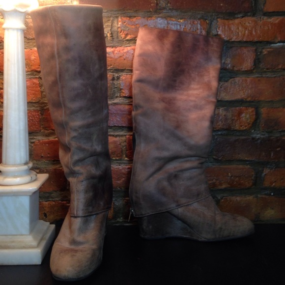 Steven light brown leather tall wedge boots.