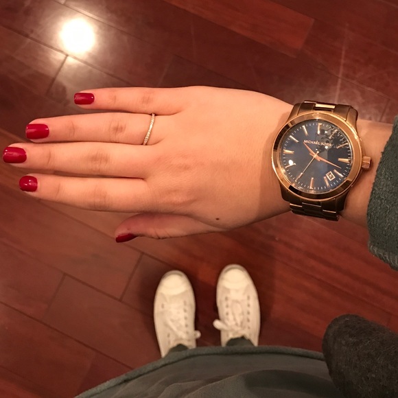 Unisex Michael Kors rose gold watch with blue face