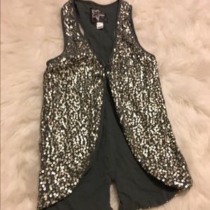 Sequin vest.