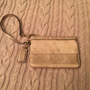Gorgeous gold Coach wristlet
