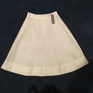 Woman's white A line skirt dressy. Sz M Grace