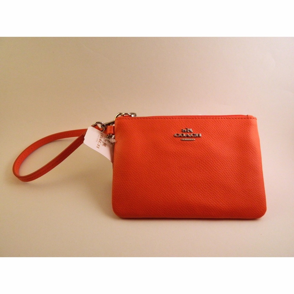 BNWT Coach Coral Wristlet