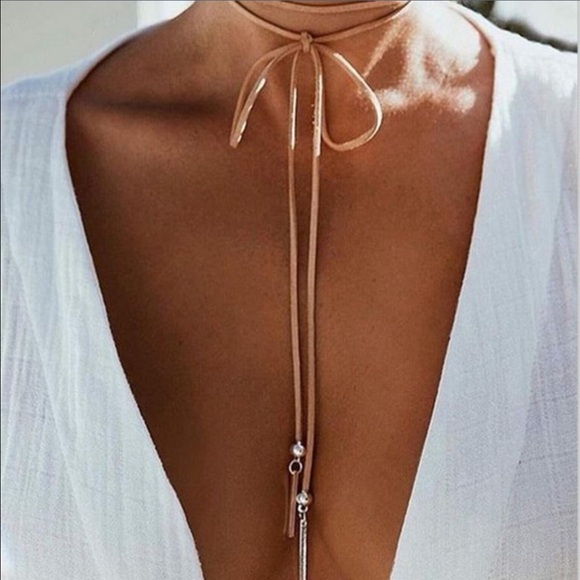 Long black tie choker.