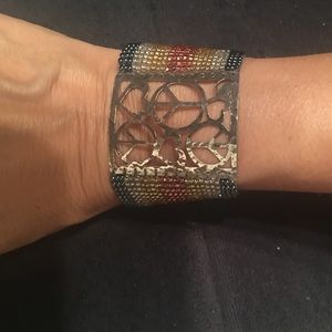 Silver piece sign and heart beaded bracelet