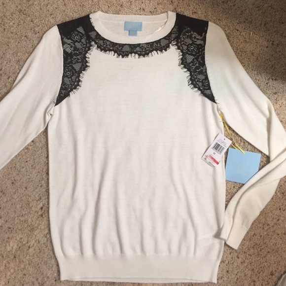Lite weight sweater cream with black lace.