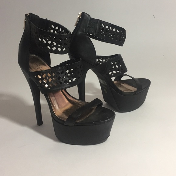 Black strapping heels