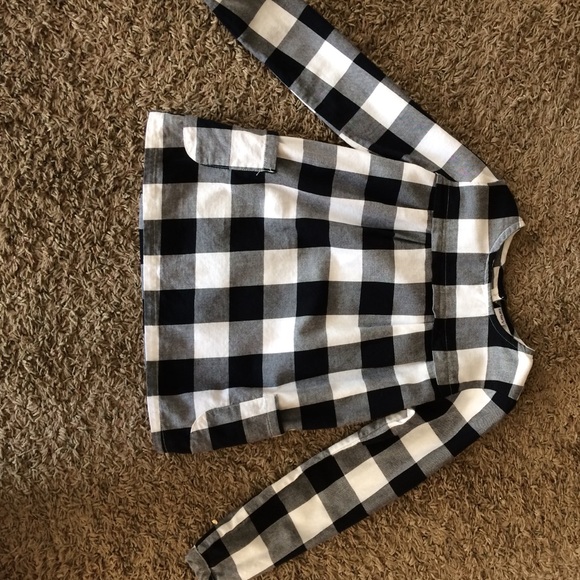 Black/white plaid shirt. Girls size 6x