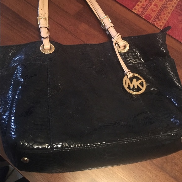 Michael Kors Handbags - Snake skin Authentic **MICHAEL KORS PURSE EUC**