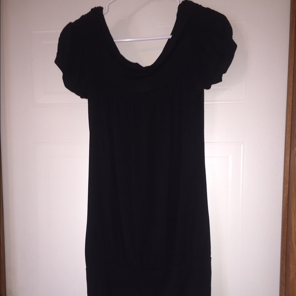 Can be worn as a Black shirt or short dress