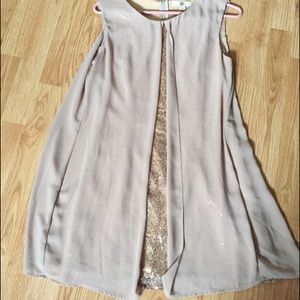 Peek-a-boo party dress. Size small.